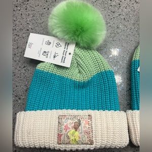 Disney Tiana love your melon winter hat with REMOVABLE Pom!  New with tags